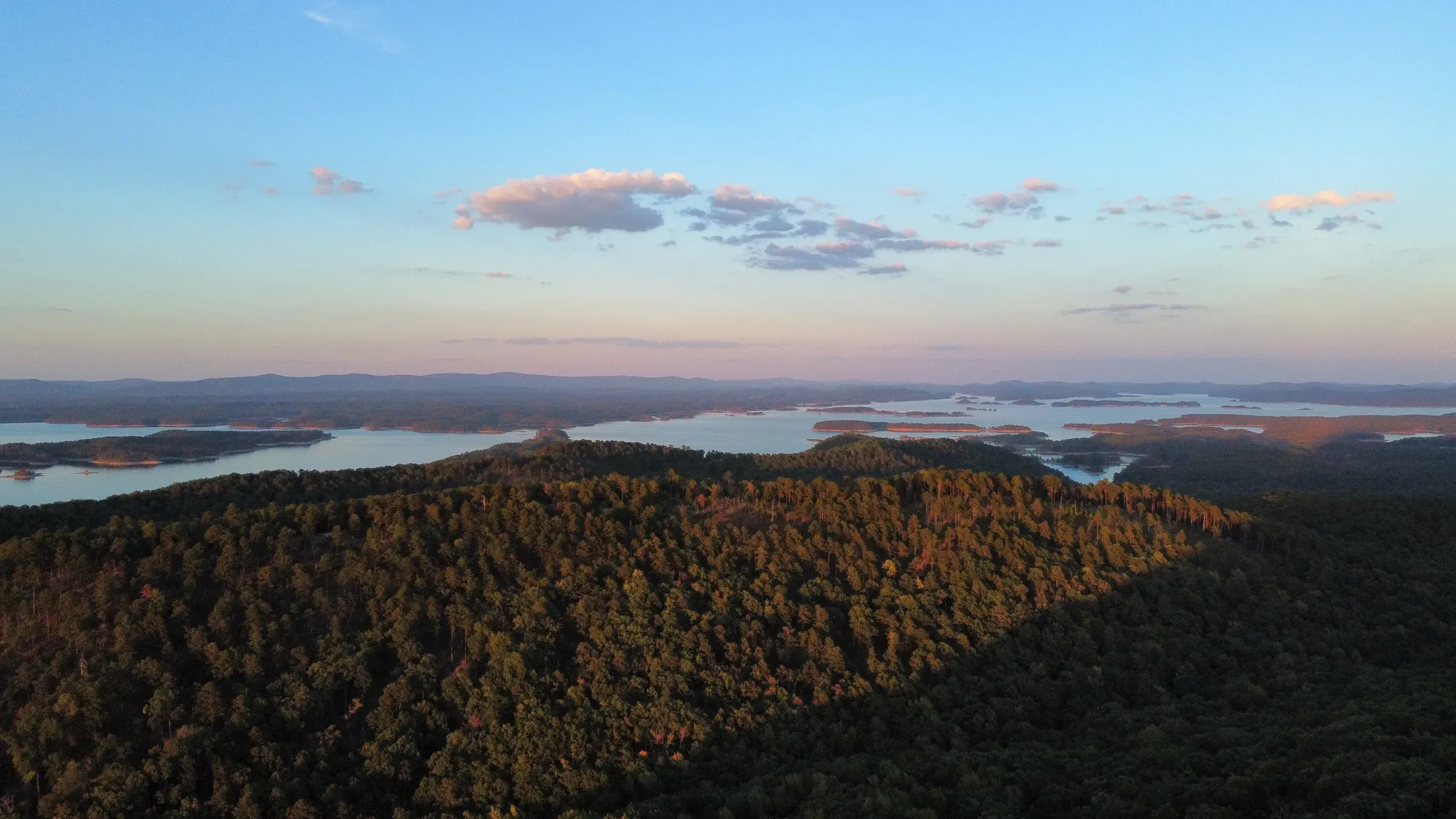 Lake Ouachita's islands at sunset, seen from above the tree line